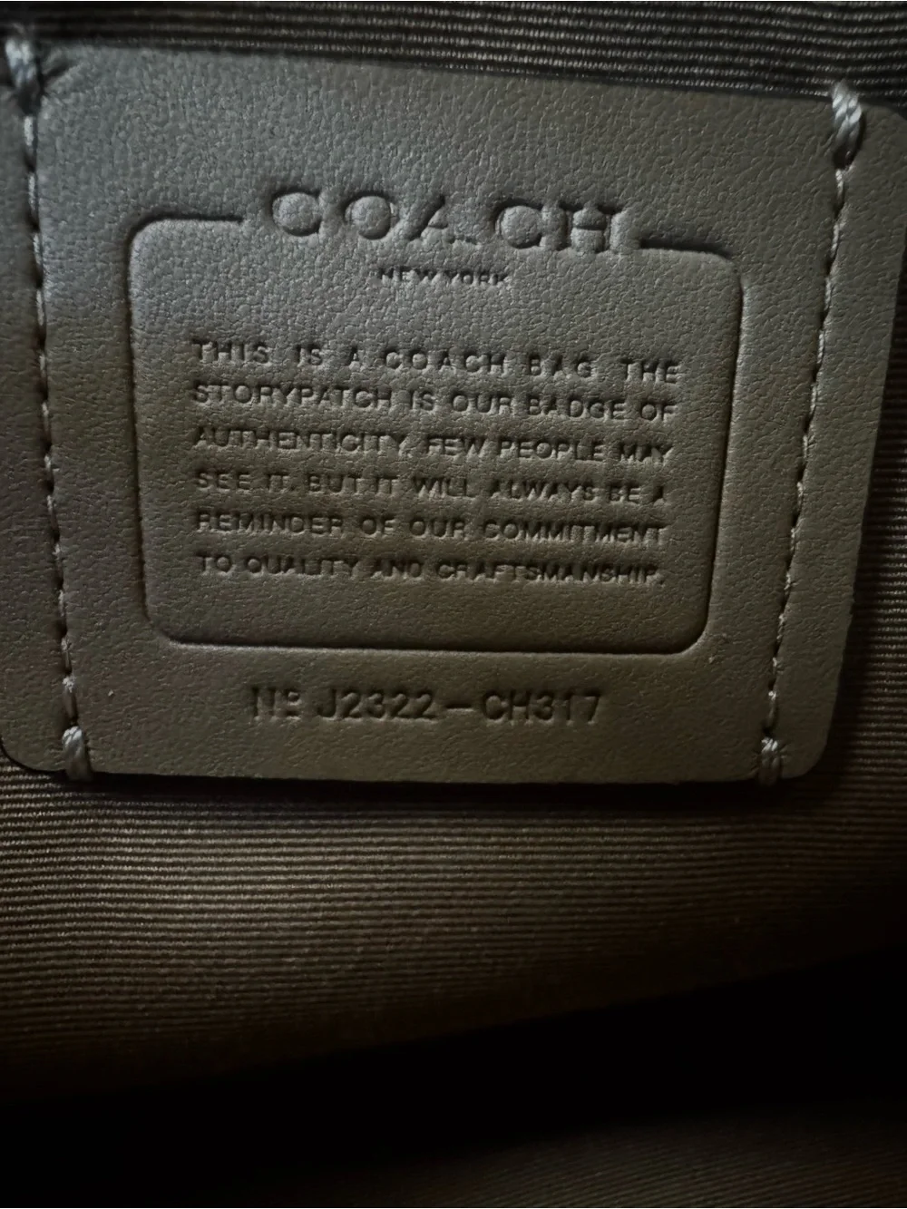 Coach White Pebbled Leather Satchel with Black Trim and Silver Hardware
